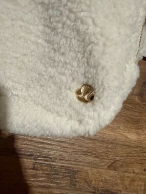 lululemon athletica Cream Sherpa Pouch with Gold Hardware